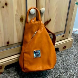 Convertible sling backpack. Leather. Like new